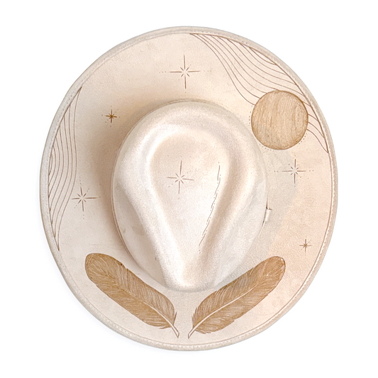Ivory rancher hat with feather, star and wavy designs 