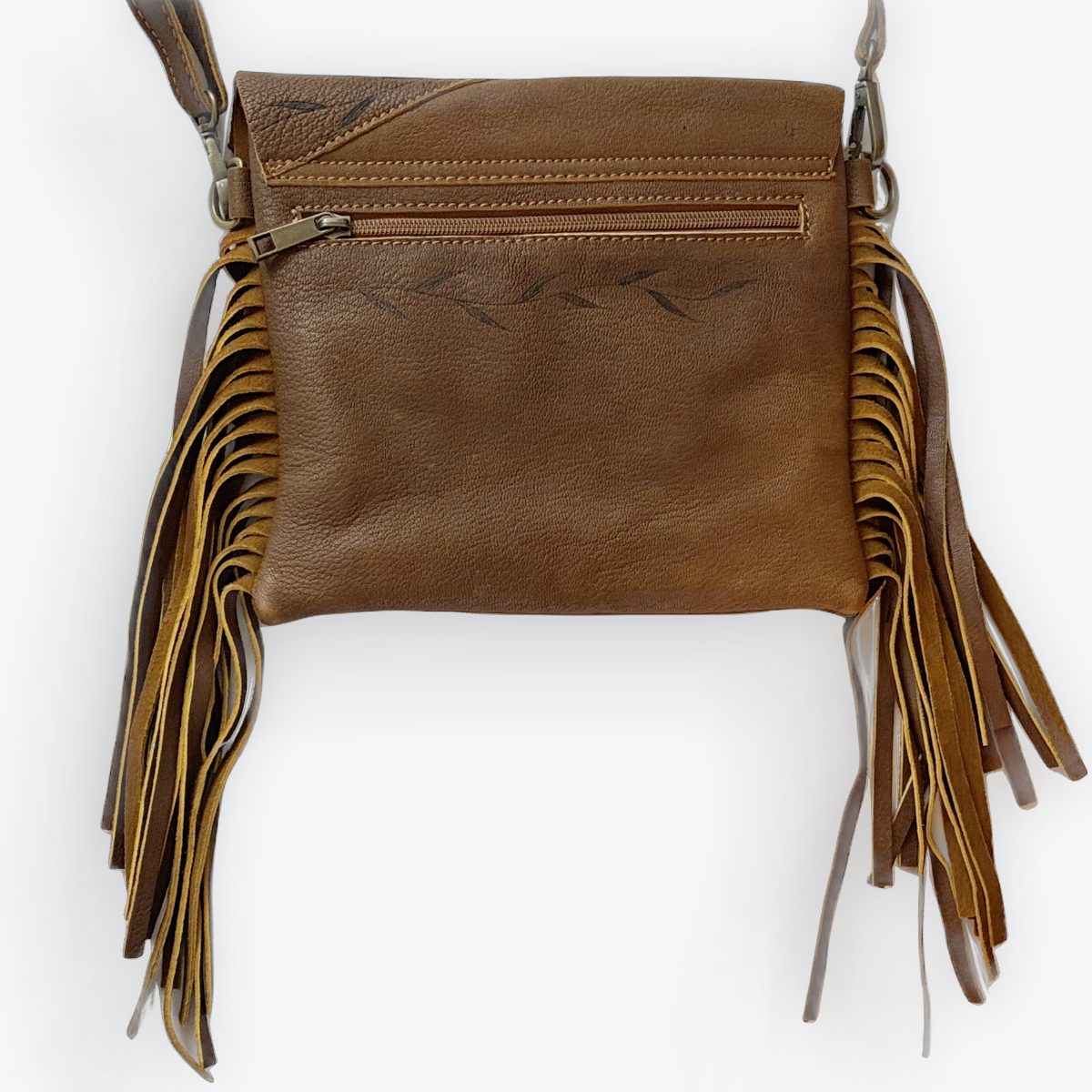 Brown leather bag with fringe on a white background