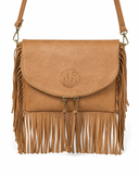 A tan faux-leather crossbody bag with a flap front, long fringe trim, and gold-tone hardware, shown against a plain white background.