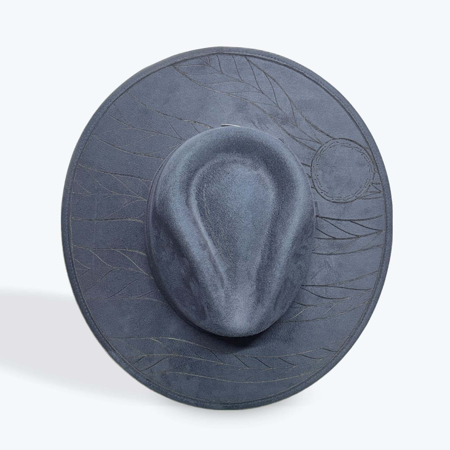 Navy hat with a designed surface on a white background