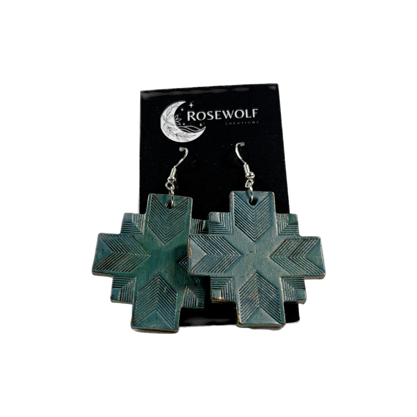 Green geometric earrings on a Rosewolf branded card against a white background