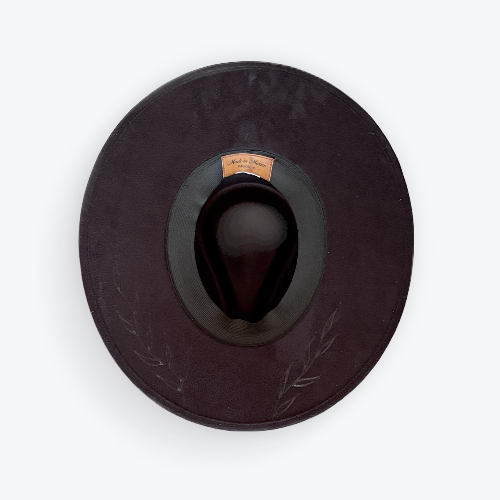 Black vegan suede hat with subtle vine designs 