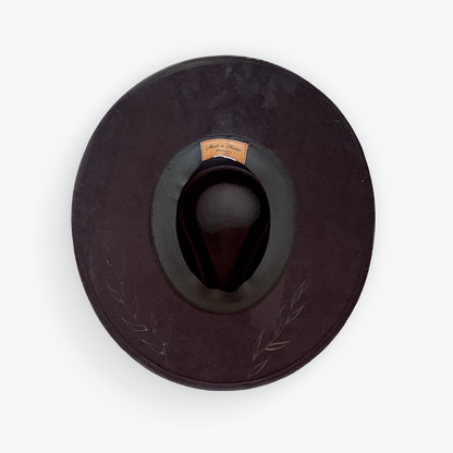Black vegan suede hat with subtle vine designs 