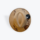 A light brown felt fedora hat with dark brown leaf engravings on the brim, shown from a top-down view on a white background with a small black circular tag attached.